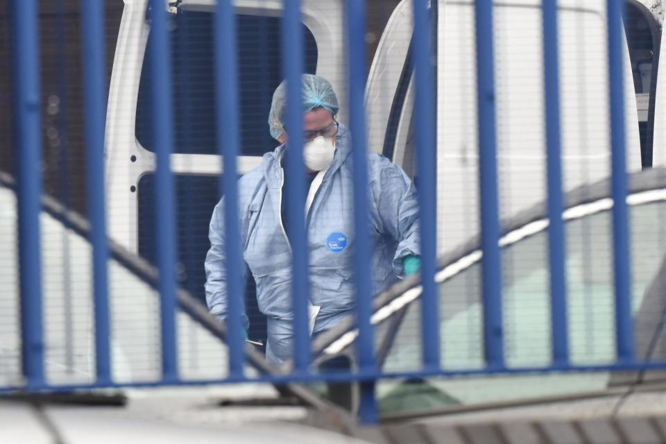 A forensics officer at the Croydon Custody Centre where a police sergeant has been shot dead (Jeremy Selwyn)