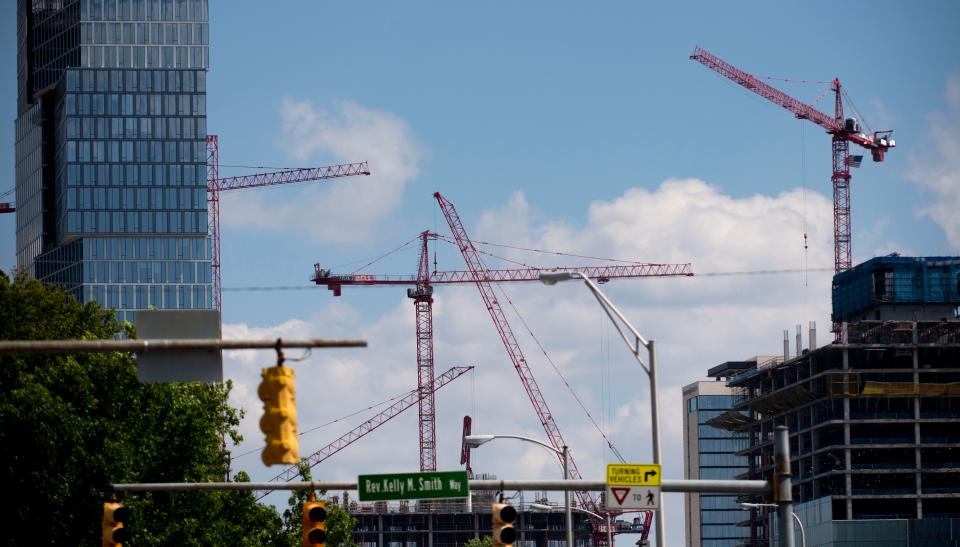 Construction cranes appear in Nashville’s skyline as more development continues  downtown in Nashville, Tenn., Tuesday, June 27, 2023.