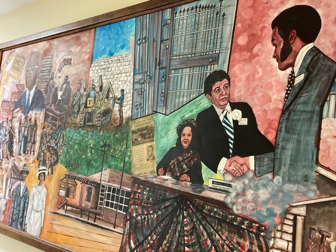 Central section of a mural depicting Douglass State Bank in Kansas City, Kansas. The painting by artist Hank Smith was commissioned in 1974.