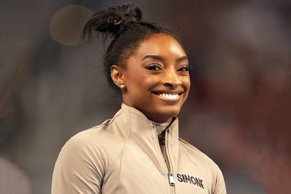 <p>Elsa/Getty</p> Simone Biles smiles during the 2024 Xfinity U.S. Gymnastics Championships