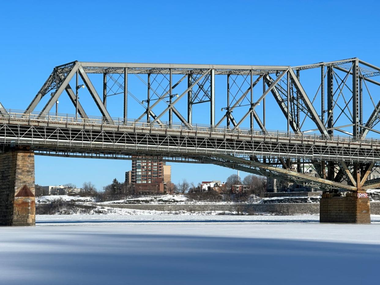 The Alexandra Bridge connecting Ottawa and Gatineau is currently slated to be demolished by the federal government, which cites its deteriorating condition. The bridge opened in 1901.  (Guy Quenneville/CBC - image credit)