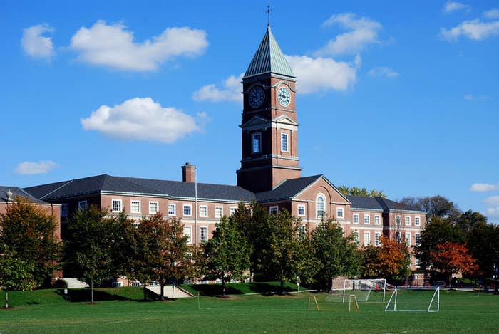 Fancy school with large clock on the building