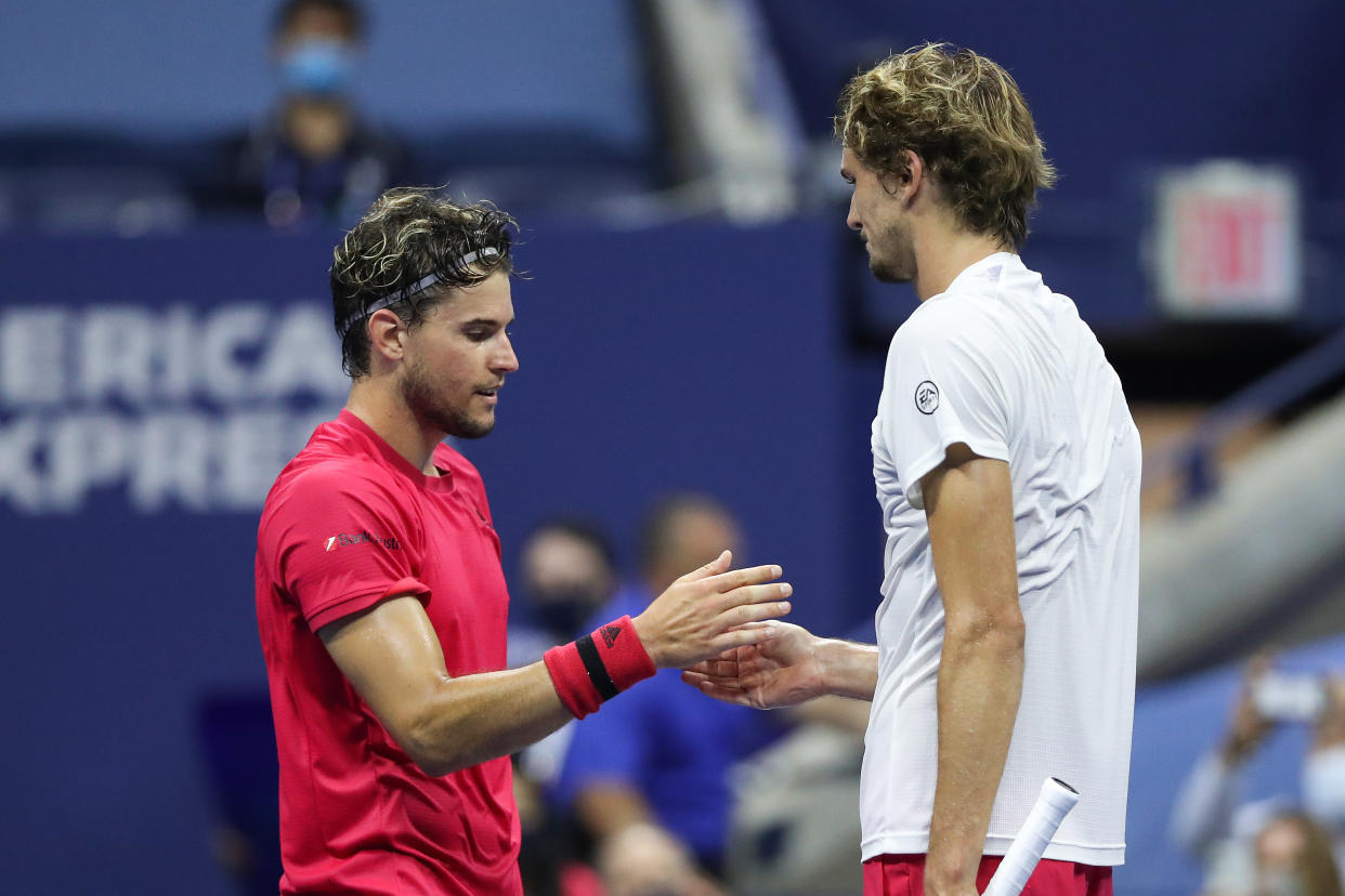 NEW YORK, NEW YORK - SEPTEMBER 13: (L-R) Dominic Thiem of Austria shakes hands with Alexander Zverev of Germany after winning their Men's Singles final match on Day Fourteen of the 2020 US Open at the USTA Billie Jean King National Tennis Center on September 13, 2020 in the Queens borough of New York City. (Photo by Matthew Stockman/Getty Images)