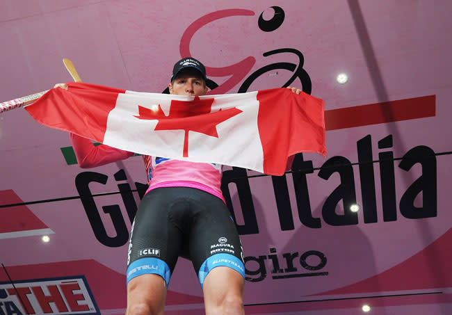 Canada's Ryder Hesjedal celebrates on the podium after winning the 95th Giro d'Italia (Canadian Press)