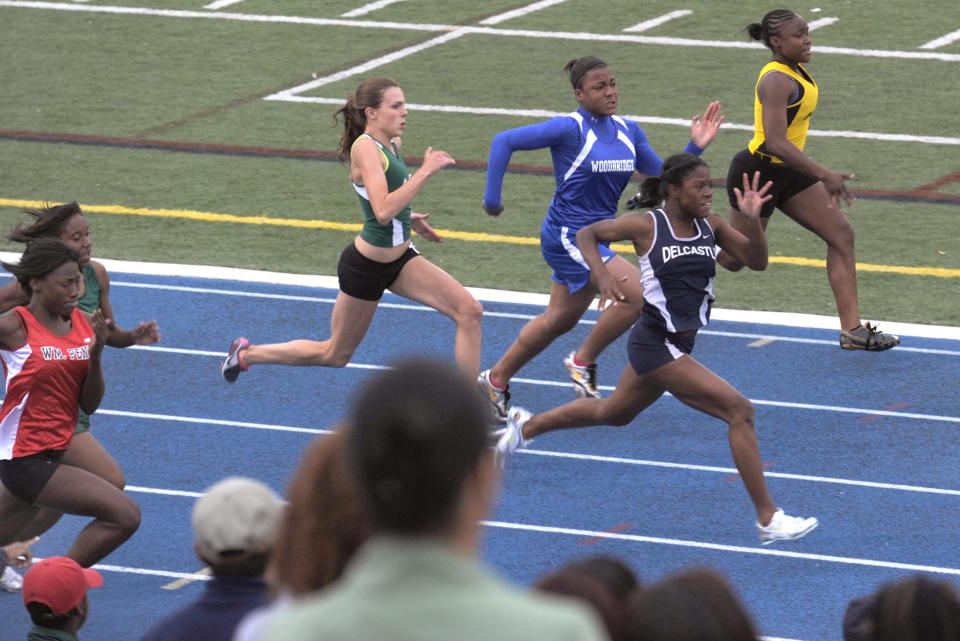 Alexis Reeves of Delcastle bursts into the lead to win the girls 100 meter dash at the Meet of Champions Wednesday May 19, 2010.
