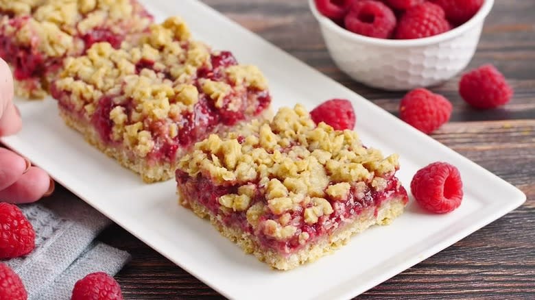 Raspberry streusel bars on plate