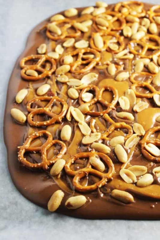 <p>Our Happy Mess</p><p>This easy sweet and salty milk chocolate bark is packed with caramel, peanuts and pretzels and tastes like the best candy bar ever.</p><p><strong>Get the recipe: </strong><a href="https://www.ourhappymess.com/sweet-and-salty-chocolate-bark/" rel="nofollow noopener" target="_blank" data-ylk="slk:Sweet and Salty Chocolate Bark;elm:context_link;itc:0;sec:content-canvas" class="link "><strong>Sweet and Salty Chocolate Bark</strong></a></p>