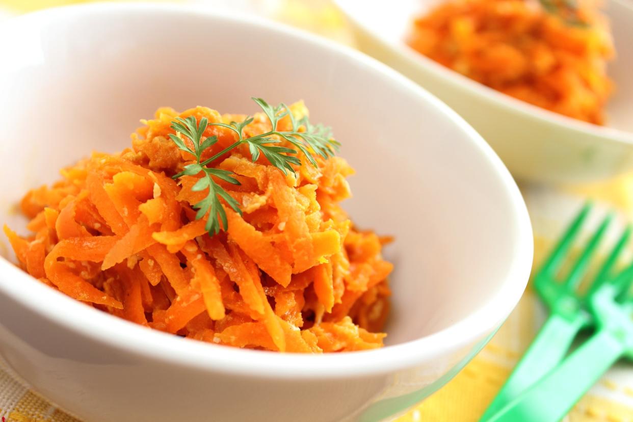 Grated carrot salad with green garnish