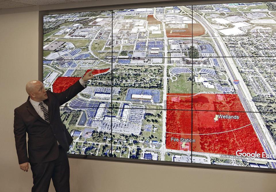 Columbus Police Detective Jason Brammer shows an area in which detectives have searched for Tyler Davis during a news conference Sept. 3, 2019, at the Columbus Division of Police Headquarters.