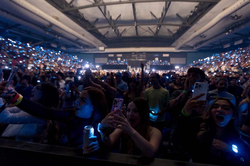 The crowd sings along with Peso Pluma as he performs his second show at the El Paso County Coliseum in El Paso, Texas, on Friday, Aug. 4, 2023.