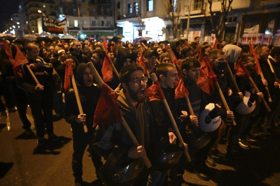 People shout slogans during a protest in the port city of Thessaloniki, northern Greece, Thursday, March 2, 2023. Several rallies held in the country protesting the deaths of dozens of people late Tuesday, in Greece's worst recorded rail accident. (AP Photo/Giannis Papanikos)