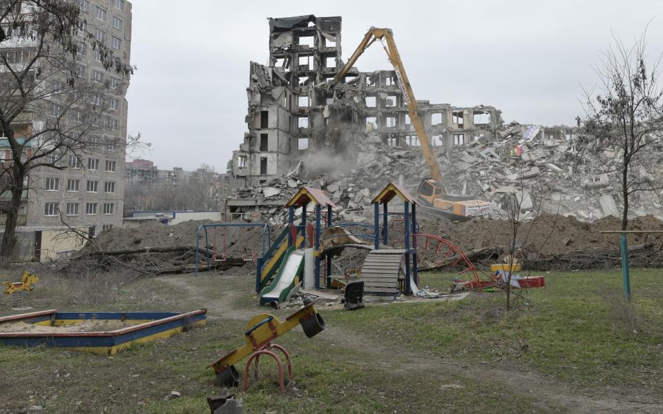 Damaged buildings are being demolished by heavy duty machine as Russia-Ukraine war continues in Mariupol's Russian-controlledAnadolu Agency via Getty Images territory - Anadolu Agency via Getty Images