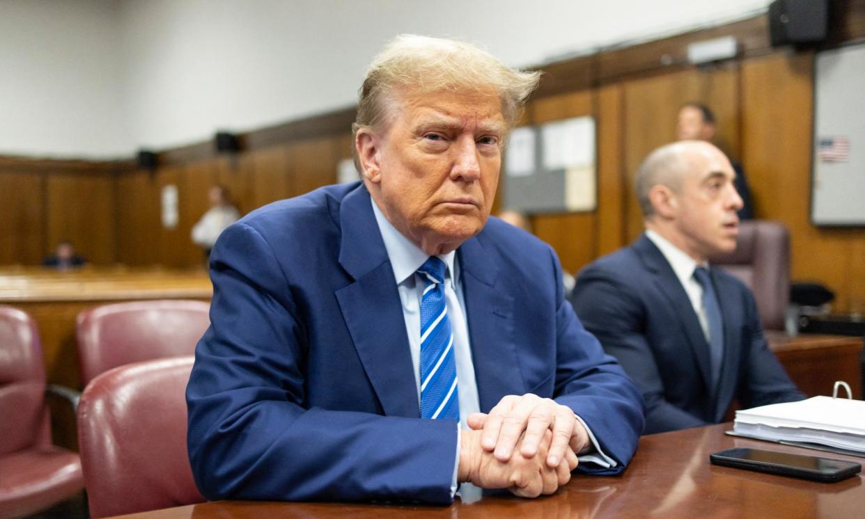 <span>Donald Trump attends the second day of his trial on Tuesday.</span><span>Photograph: Justin Lane/AFP/Getty Images</span>