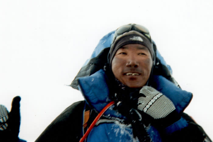 Kami Rita Sherpa, shown above summiting Mount Everest in 2010, has just clinched his 30th summit; (photo/Creative Commons)