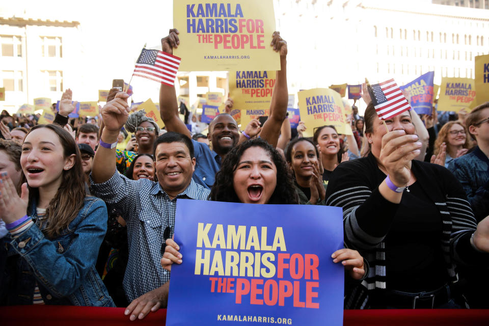 Supporters cheer while listening to U.S. Senator Kamala Harris speak at the launch of her campaign for President of the United States at a rally at Frank H. Ogawa Plaza in her hometown of Oakland, California, U.S., January 27, 2019.  REUTERS/Elijah Nouvelage