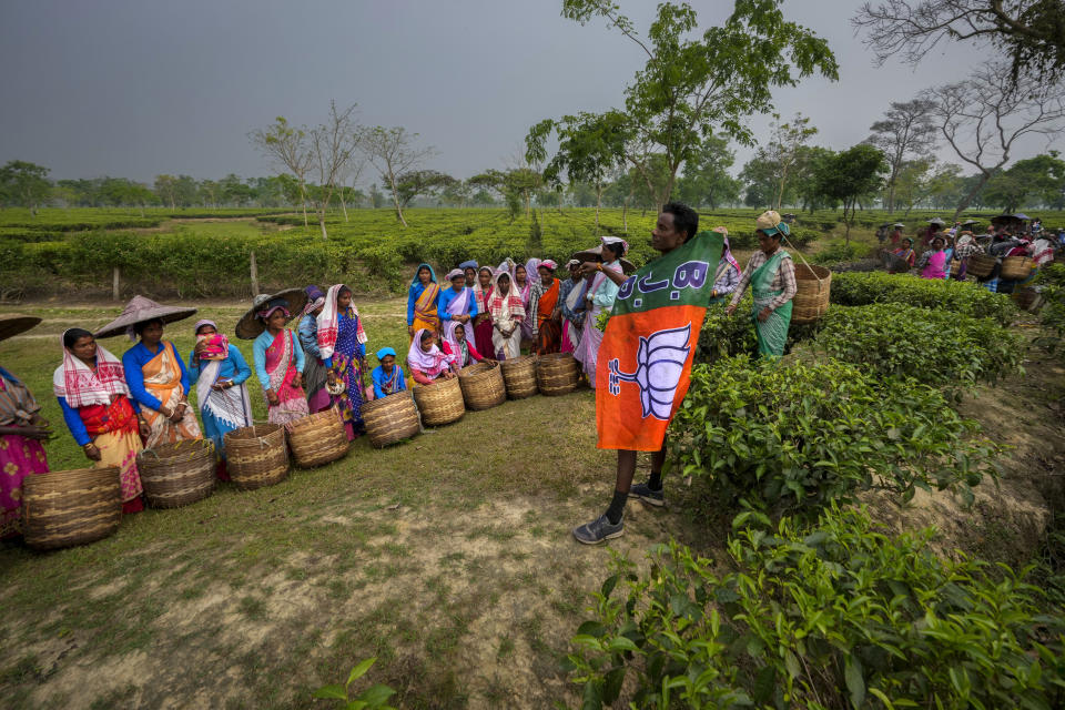 Chandra Saora, 45, a tea garden supervisor, campaigns for the Bharatiya Janata Party ahead of the first phase of national elections in Marioni in upper Assam, India, Tuesday, April 16, 2024. (AP Photo/Anupam Nath)