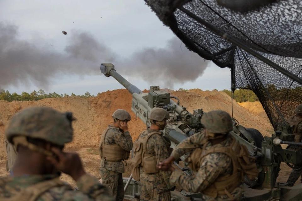 Marines with 10th Marine Regiment, 2nd Marine Division, and French Marines with the 3rd Regiment D'artillerie de Marine fire an M777 howitzer during Exercise Rolling Thunder at Fort Bragg, North Carolina, Oct. 16, 2022. The Marines will be at Fort Liberty from June 4-11, 2023.