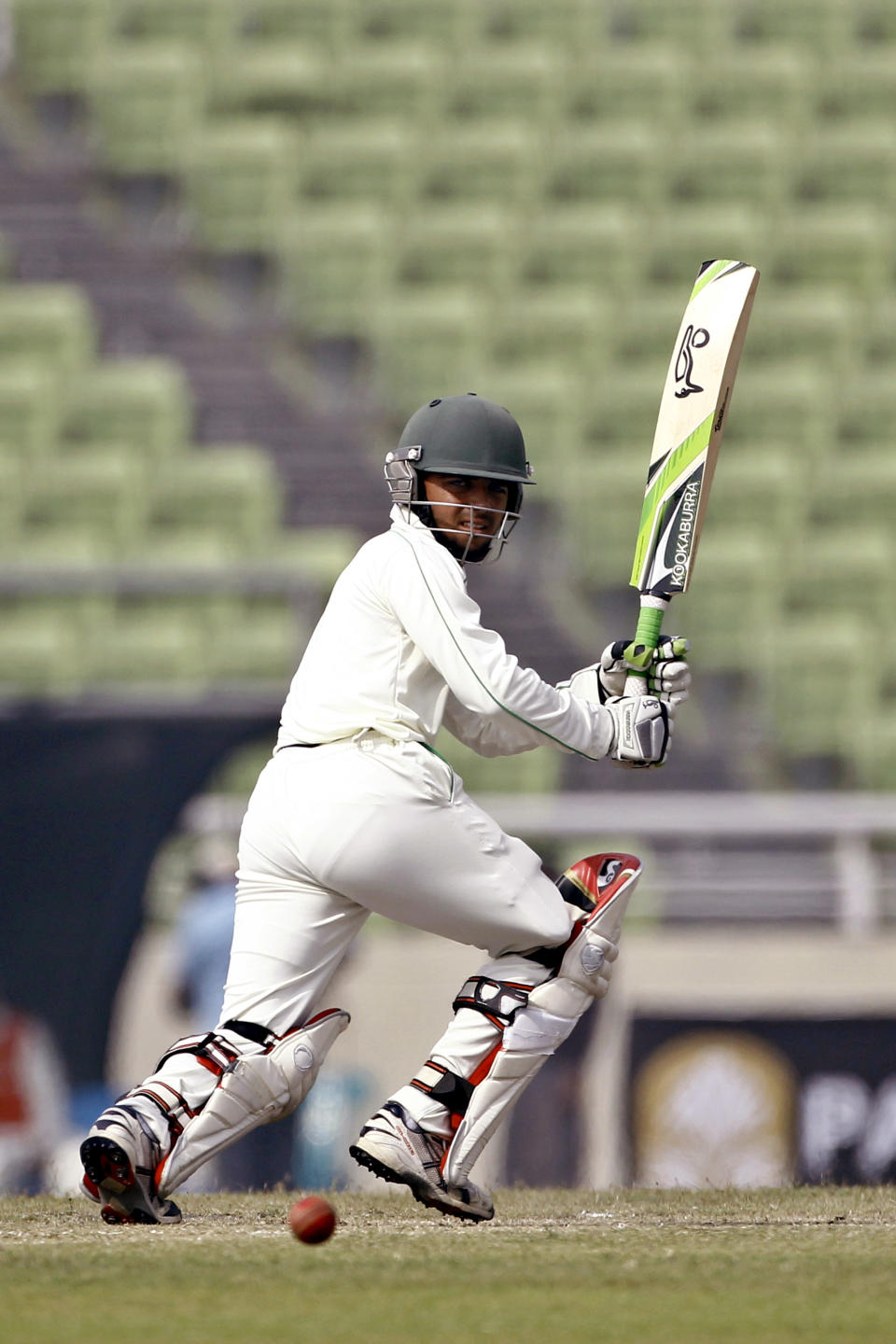 Bangladesh's Mominul Haque plays a shot against Sri Lanka on the fourth day of their first test cricket match in Dhaka, Bangladesh, Thursday, Jan. 30, 2014. (AP Photo/A.M. Ahad)