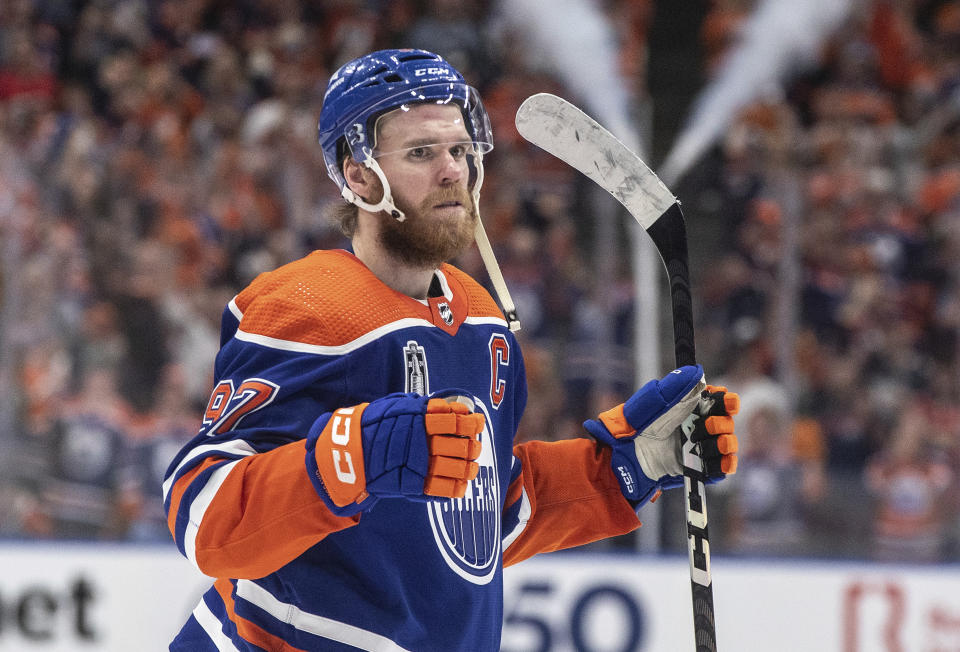 Edmonton Oilers' Connor McDavid celebrates the team's win over the Florida Panthers in Game 4 of the NHL hockey Stanley Cup Final, Saturday, June 15, 2024, in Edmonton, Alberta. (Jason Franson/The Canadian Press via AP)