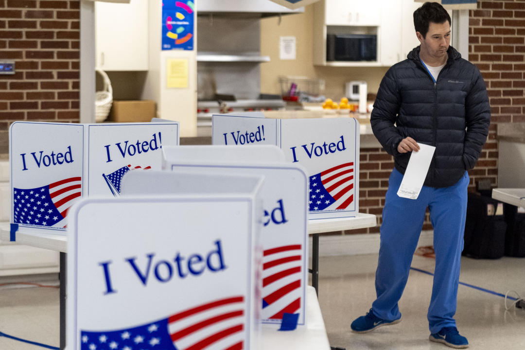 A person at a voting site.