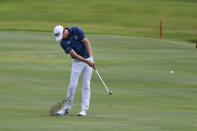 Harris English hits on the 18th fairway during the first round in the World Golf Championship-FedEx St. Jude Invitational tournament, Thursday, Aug. 5, 2021, in Memphis, Tenn. (AP Photo/John Amis)