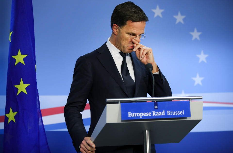 FILE - In this Friday, Feb. 21, 2020 file photo, Dutch Prime Minister Mark Rutte speaks during a media conference at the end of an EU summit in Brussels. European Union leaders are preparing for a new virtual summit, which will take place Thursday, April 23, 2020, to take stock of the damage the coronavirus has inflicted on the lives and livelihoods of the bloc's citizens and to thrash out a more robust plan to revive their ravaged economies. (AP Photo/Olivier Matthys, File)