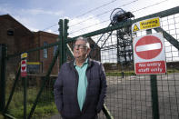 Former miner Raymond Gill poses for a picture near Haig Colliery Mining Museum close to the site of a proposed new coal mine near the Cumbrian town of Whitehaven in northwest England, Monday, Oct. 4, 2021. (AP Photo/Jon Super)