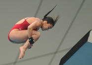 Canada's Meaghan Benfeito competes in the women's 10-metre platform final diving event in the FINA World Championships at the outdoor diving pool of the Oriental Sports Center, in Shanghai, on July 21, 2011. AFP PHOTO / MARK RALSTON (Photo credit should read MARK RALSTON/AFP/Getty Images)