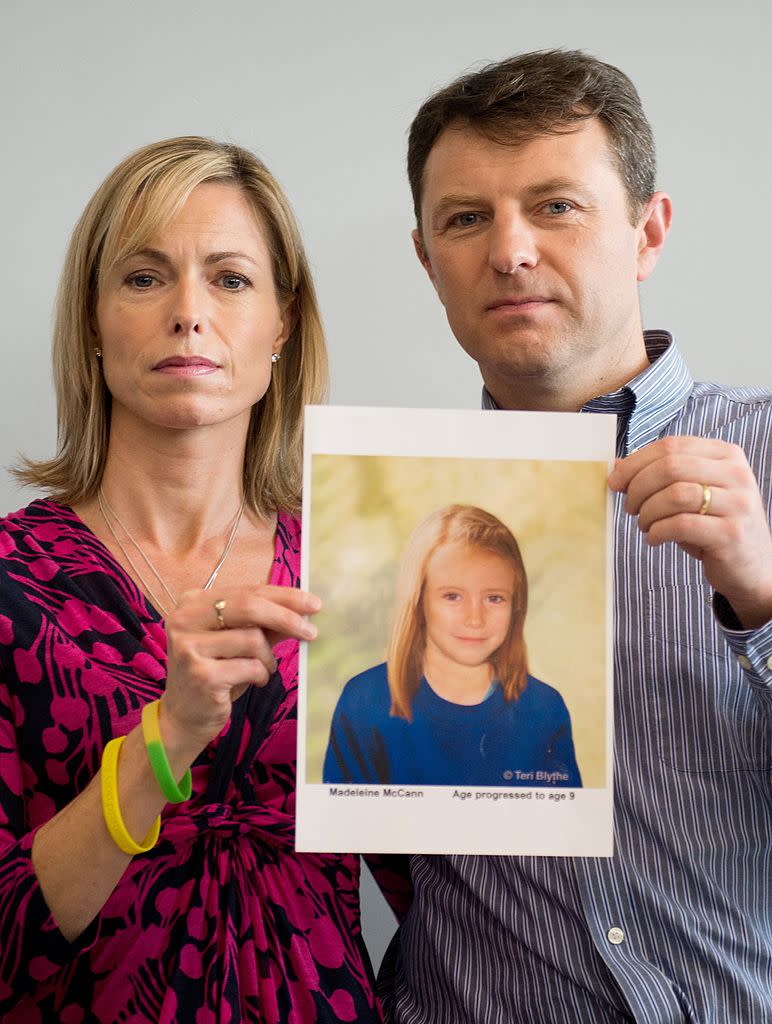 Parents of missing girl Madeleine McCann, Kate (L) and Gerry McCann (R) pose with an artist's impression of how their daughter might look now at the age of nine ahead of a press conference in central London on May 2, 2012 five years after Madeleine's disappearance while on a family holiday in Portugal.  Aged three at the time, the artist's impression depicts how Madeleine may now look, based on family photos of her, along with childhood images of her parents.  AFP PHOTO / LEON NEAL        (Photo credit should read LEON NEAL/AFP/GettyImages)