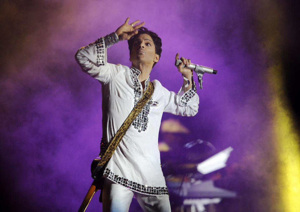 FILE - In this April 26, 2008 file photo, Prince performs during his headlining set on the second day of the Coachella Valley Music and Arts Festival in Indio, Calif. Prince’s estate will take over management of the late rock star’s studio complex near Minneapolis. Graceland Holdings, which runs Elvis Presley’s tourist attraction in Memphis, Tennessee, had been operating Prince’s Paisley Park in Chanhassen as a museum since October 2016. (AP Photo/Chris Pizzello, File)