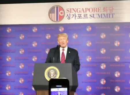 U.S. President Donald Trump begins his speech at a U.S. Embassy event at Shangri-la Hotel in Singapore June 11, 2018 in this still image taken from a video obtained from social media. Instagram/@lovelanes/via REUTERS