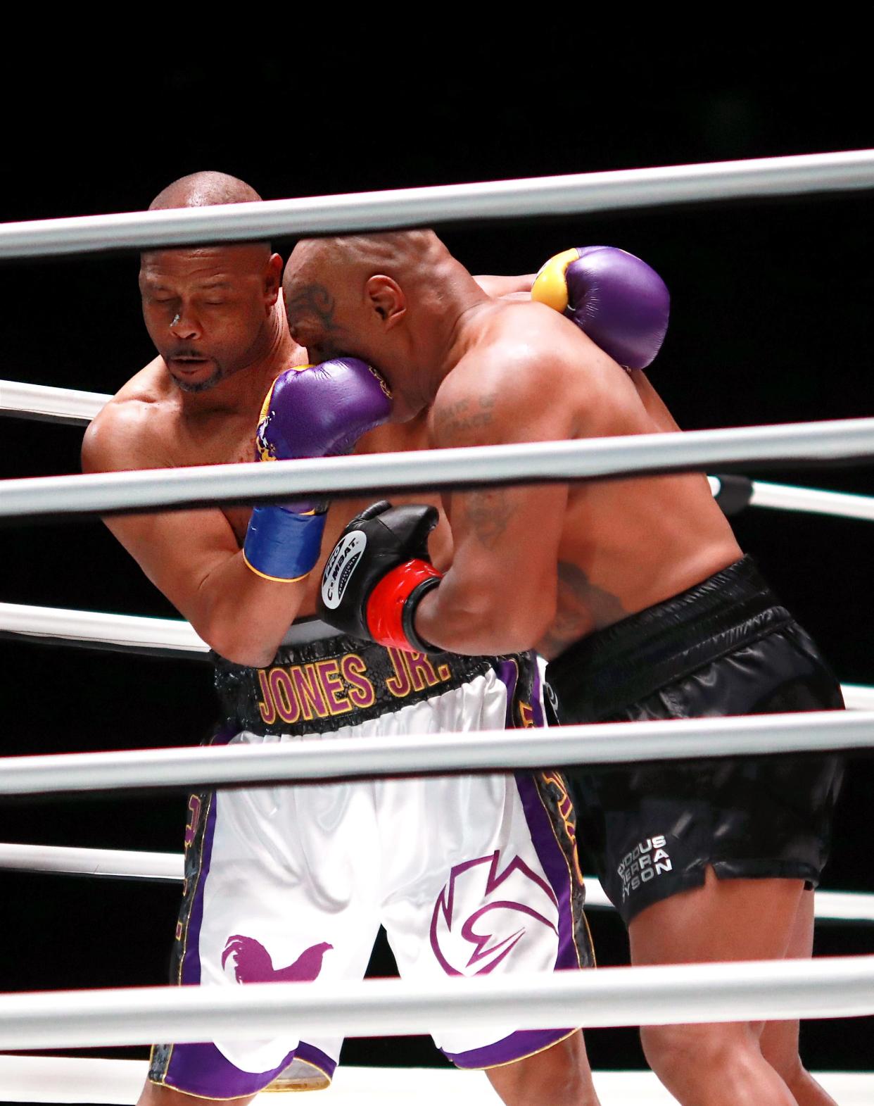 Roy Jones Jr. lands a punch during his 2020 exhibition fight with Mike Tyson. At age 54, Jones will be back in the ring this weekend at Fiserv Forum.