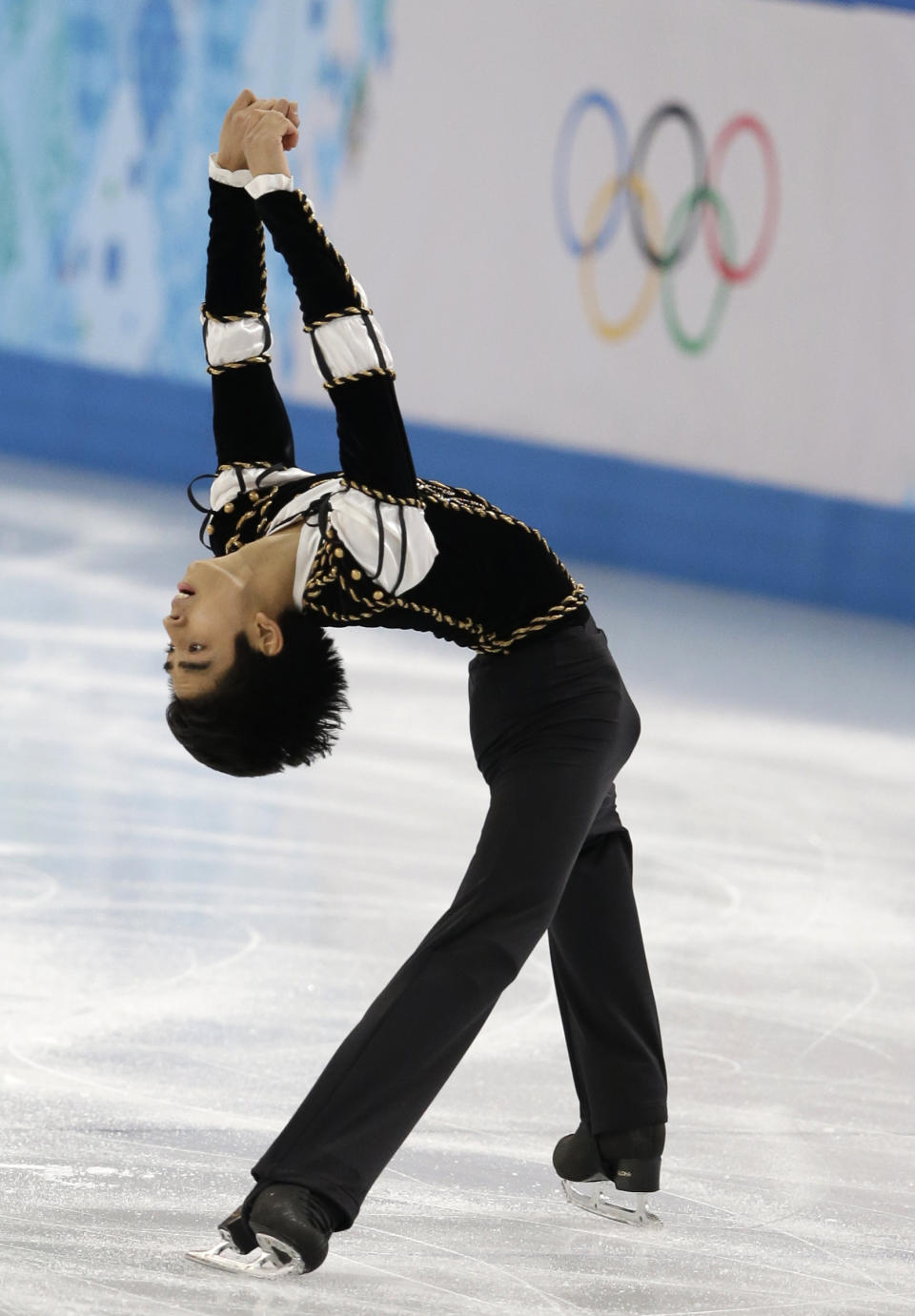 Michael Christian Martinez of the Philippines competes in the men's short program figure skating competition at the Iceberg Skating Palace during the 2014 Winter Olympics, Thursday, Feb. 13, 2014, in Sochi, Russia. (AP Photo/Darron Cummings)