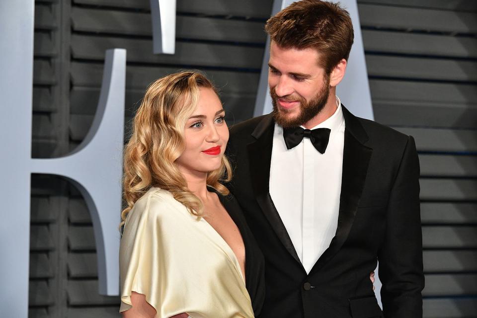 beverly hills, ca march 04 miley cyrus l and liam hemsworth attend the 2018 vanity fair oscar party hosted by radhika jones at wallis annenberg center for the performing arts on march 4, 2018 in beverly hills, california photo by dia dipasupilgetty images