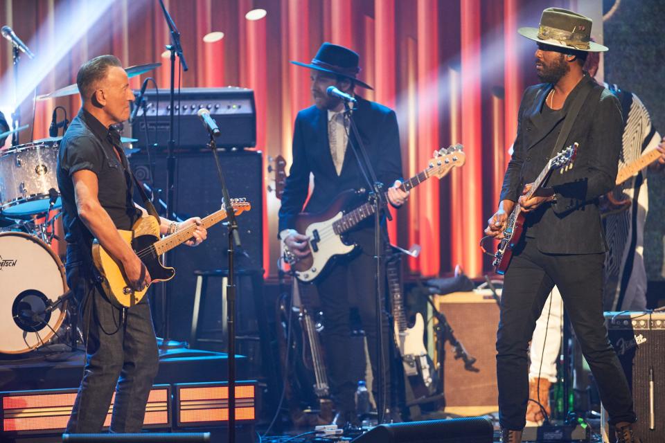 Bruce Springsteen (left) and Gary Clark Jr.  exchange licks on "Come Together"  at the 23rd Annual Kennedy Center Mark Twain Prize for American Humor honoring Jon Stewart on April 24, 2022.