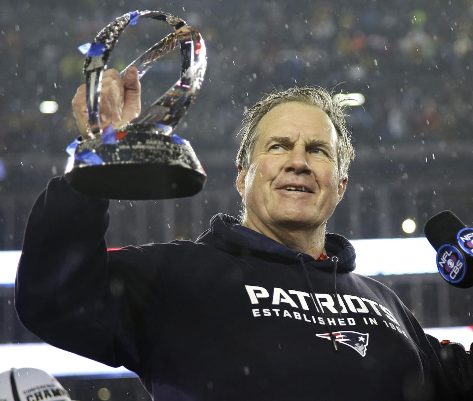 FILE - New England Patriots head coach Bill Belichick holds the championship trophy after the NFL football AFC Championship game Sunday, Jan. 18, 2015, in Foxborough, Mass. The Patriots defeated the Colts 45-7 to advance to the Super Bowl against the Seattle Seahawks. Six-time NFL champion Bill Belichick has agreed to part ways as the coach of the New England Patriots on Thursday, Jan. 11, 2024, bringing an end to his 24-year tenure as the architect of the most decorated dynasty of the league’s Super Bowl era, a source told the Associated Press on the condition of anonymity because it has not yet been announced.(AP Photo/Matt Slocum, File)