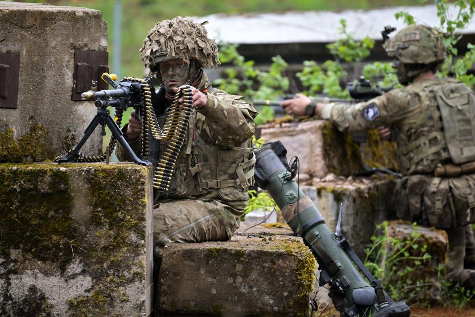 Soldiers from Royal Welsh Battlegroup take part in maneuvers during NATO exercise Hedgehog on the Estonian Latvian border on May 26, 2022 in Voru, Estonia.