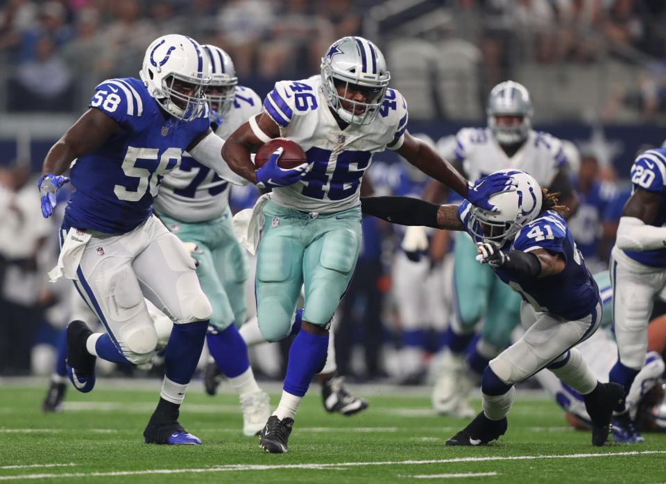 Alfred Morris, handcuff of interest. (Photo by Tom Pennington/Getty Images)