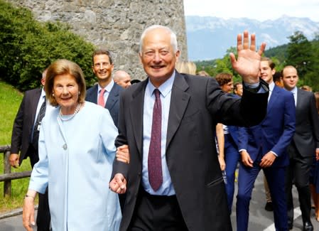 Prince Hans-Adam II of Liechtenstein waves as he is accompanied by wife Princess Marie and their son Hereditary Prince Alois of Liechtenstein in Vaduz