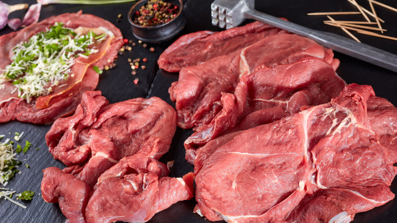 preparing beef braciole