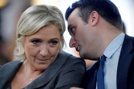 FILE PHOTO - France's far-right National Front (FN) leader Marine Le Pen (L) and vice-president Florian Philippot attend a FN political debate in Paris, France, November 15, 2016. Picture taken November 15, 2016. REUTERS/Benoit Tessier/File Photo