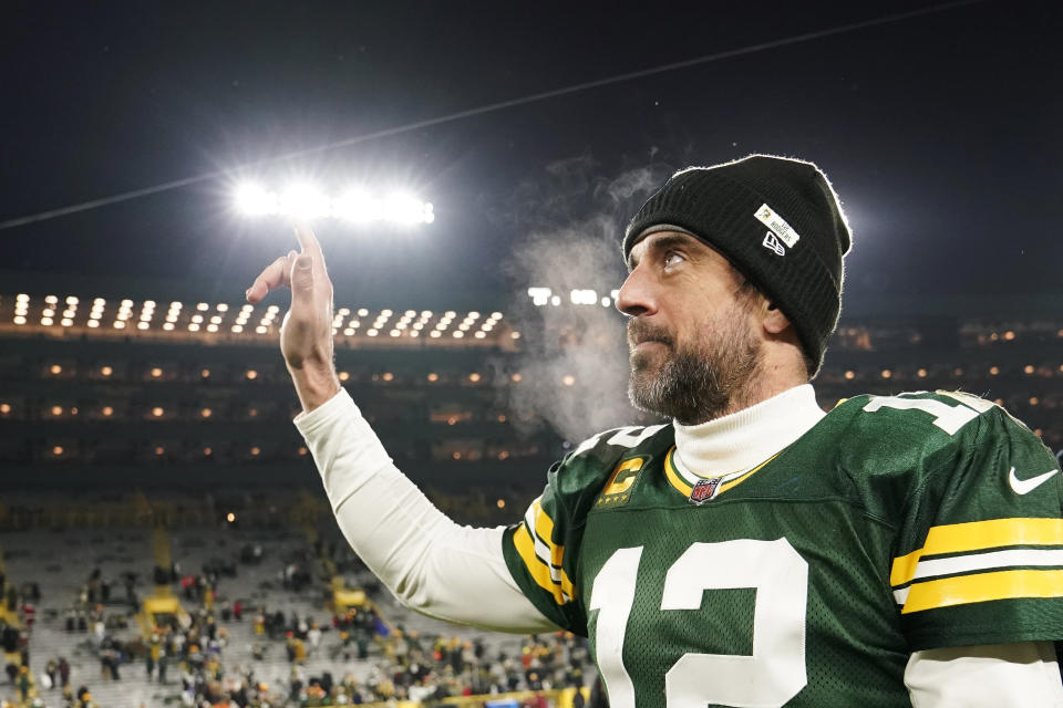 GREEN BAY, WISCONSIN - DECEMBER 19: Aaron Rodgers #12 of the Green Bay Packers walks off the field after defeating the Los Angeles Rams 24-12 at Lambeau Field on December 19, 2022 in Green Bay, Wisconsin. (Photo by Patrick McDermott/Getty Images)