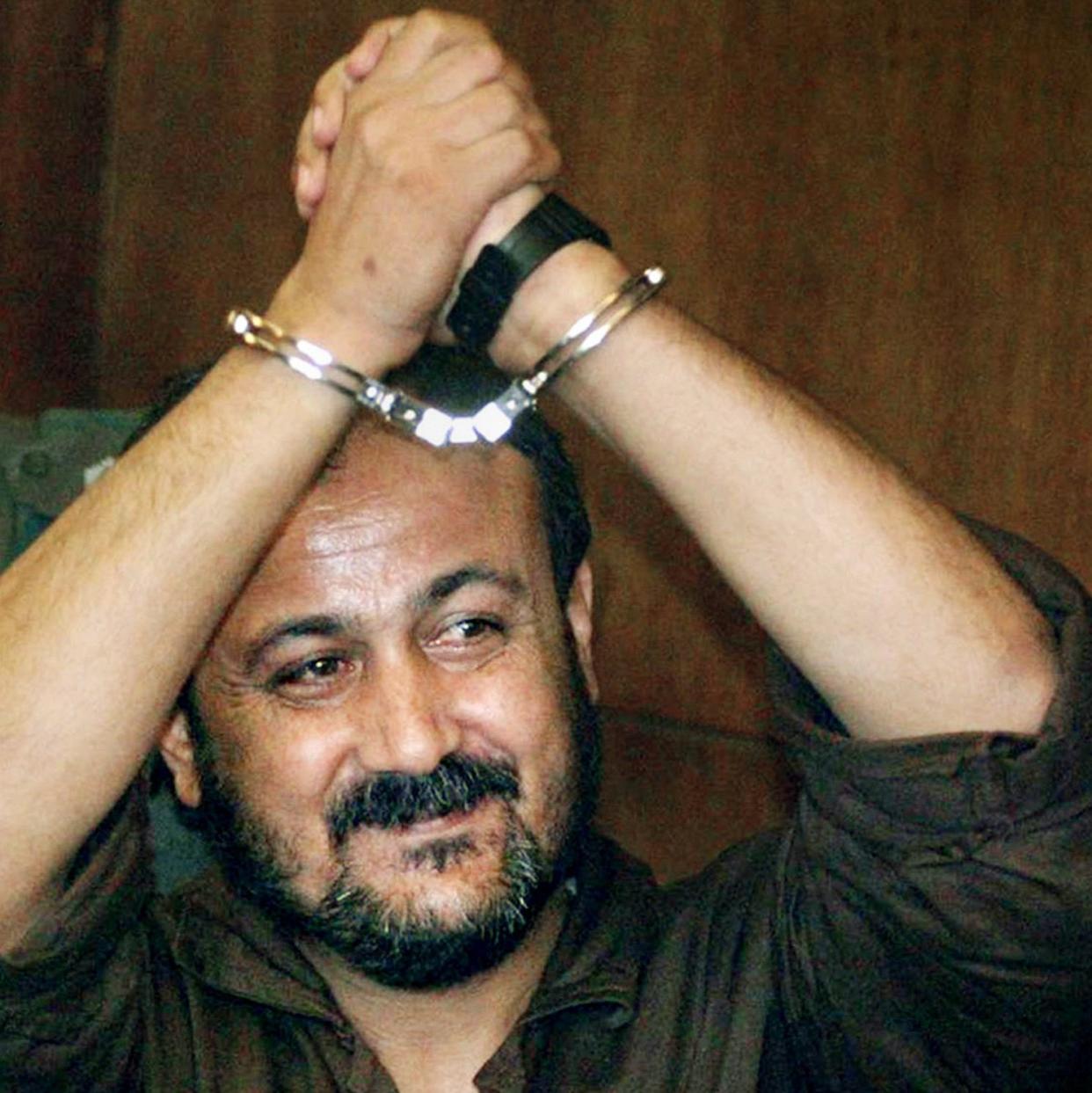 Marwan Barghouti was convicted of murder in an Israeli court but has become an icon to Palestinians - AP