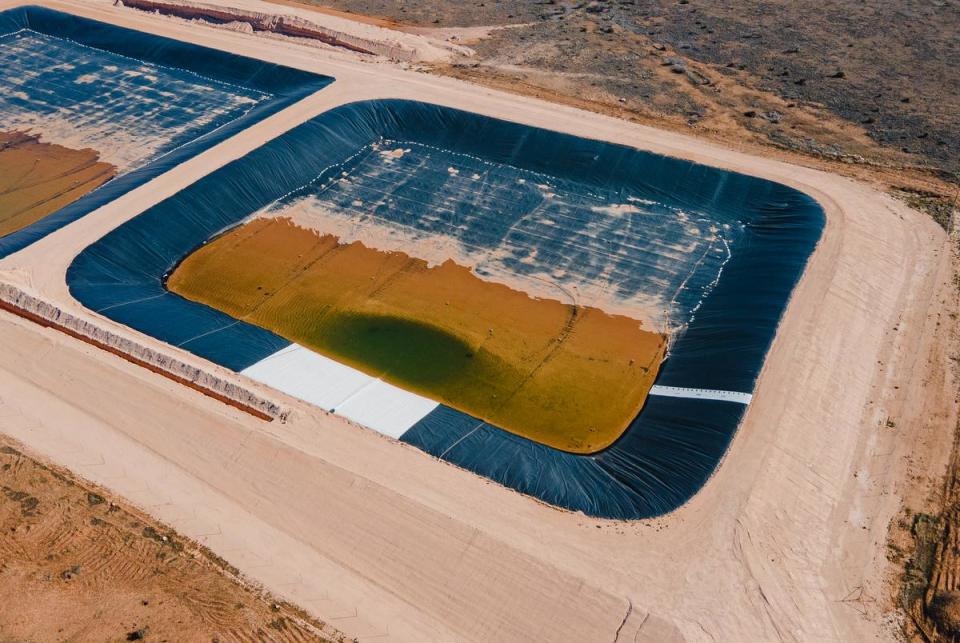 Produced water ponds, constructed by Martin Water, in Lenorah, on Feb. 24, 2024. The Railroad Commission approved the construction of the ponds, used to treat and recycle produced water from fracking, next to the Circle 6 Baptist Camp in the Permian Basin.