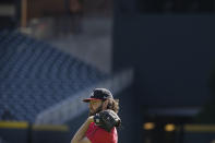 Atlanta Braves starting pitcher Ian Anderson (36) works out ahead of baseballs National League Championship Series against the Los Angeles Dodgers, Friday, Oct. 15, 2021, in Atlanta. (AP Photo/Brynn Anderson)