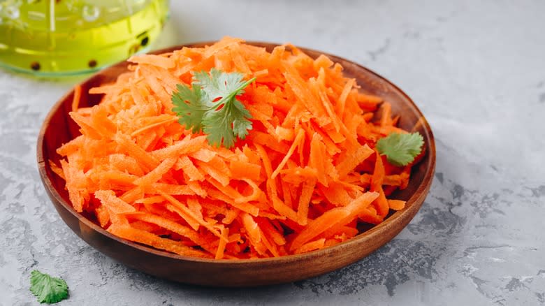 Bowl full of grated carrots