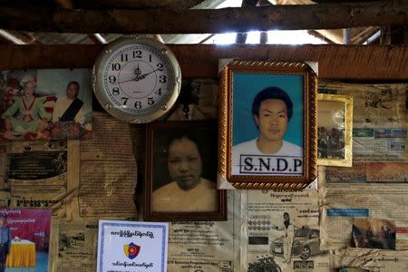 A portrait of Sai Shw Lu,17, is seen at his home after his body was found in a grave last June at Mong Yaw village in Lashio, Myanmar July 10, 2016. REUTERS/Soe Zeya Tun