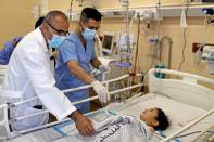 Gaza health system fight on two fronts, Covid-19 and war with Israel