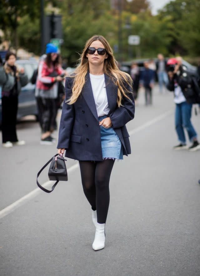 <p>Miroslava Duma paired an oversized blazer with white boots for a retro look. </p>