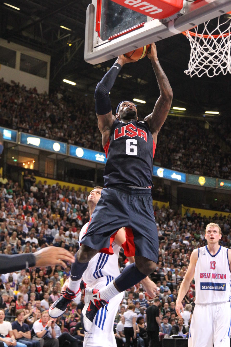 MANCHESTER, UK - JULY 19: LeBron James #6 of the 2012 US Men's Senior National Team shoots during an exhibition game against Great Britain's Men's team at the Manchester Arena on July 19, 2012 in Manchester, UK.